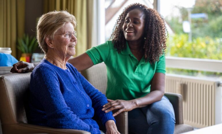 home care nurse caring for an elderly woman